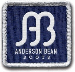 AB patch Anderson Bean Boots Logo on Blue Patch with White lettering