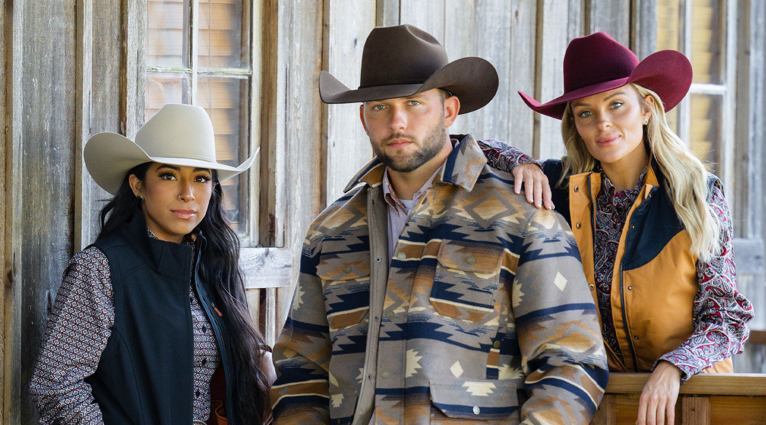 Woman in silver belly cowboy hat, man in chocolate felt cowboy hat and woman in burgundy felt cowboy hat