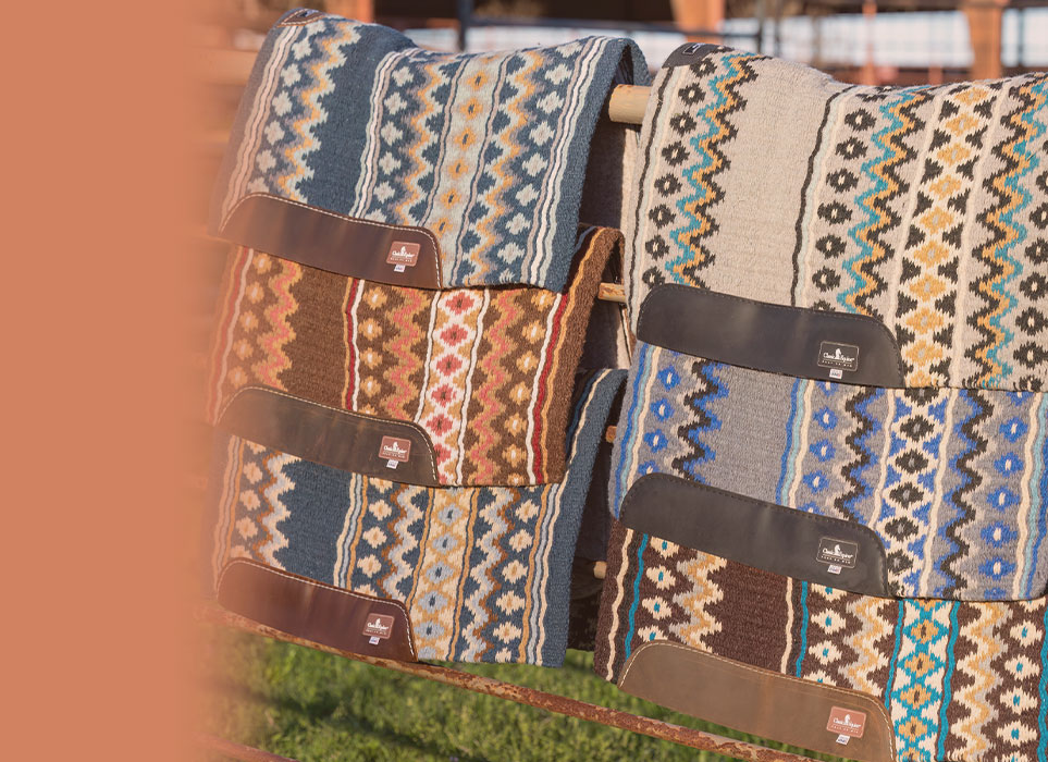 Classic Equine Saddle Pads on fence
